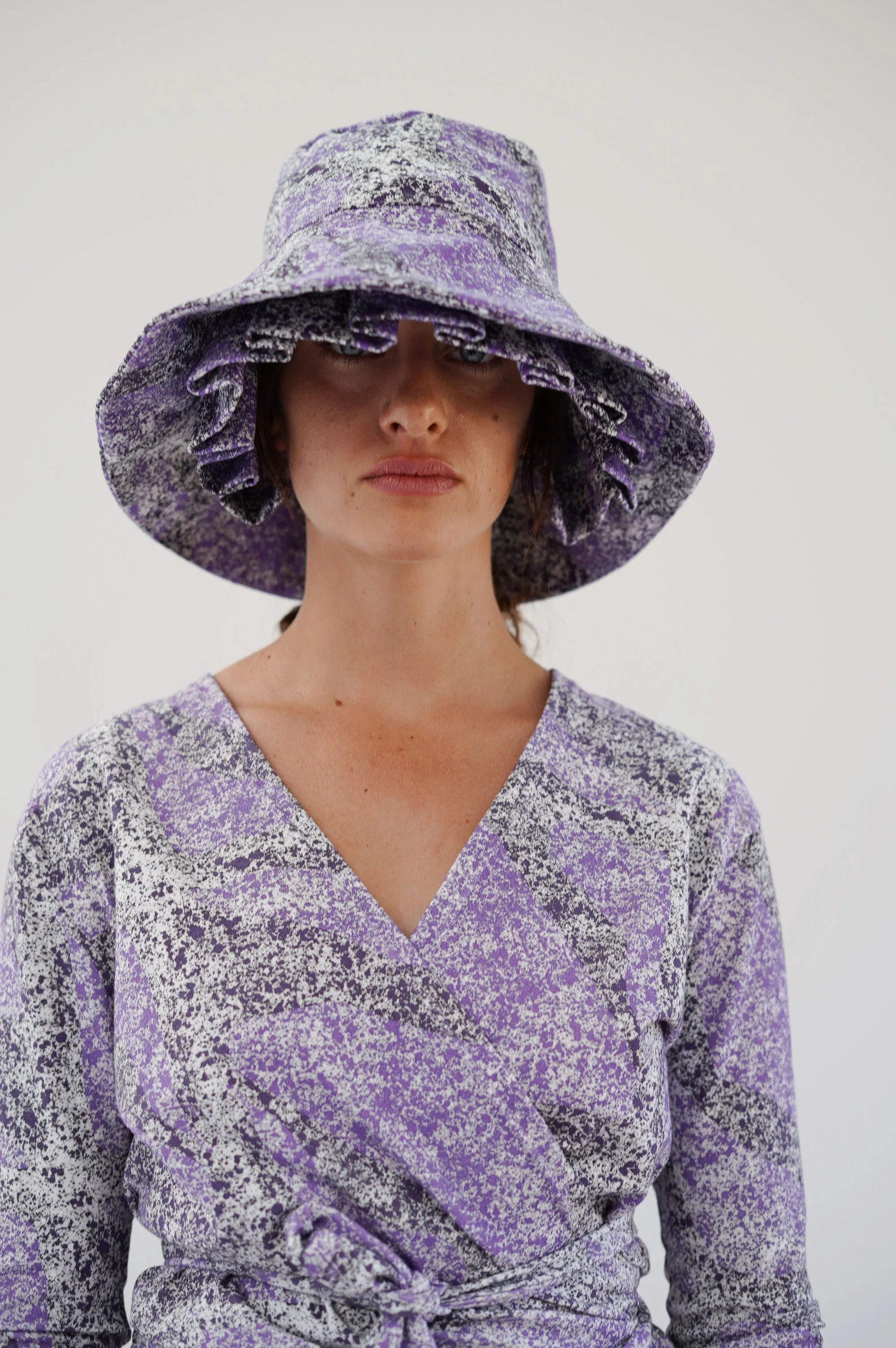 Beklina Layered Pleat Hat Splatter Purple sold by Beklina