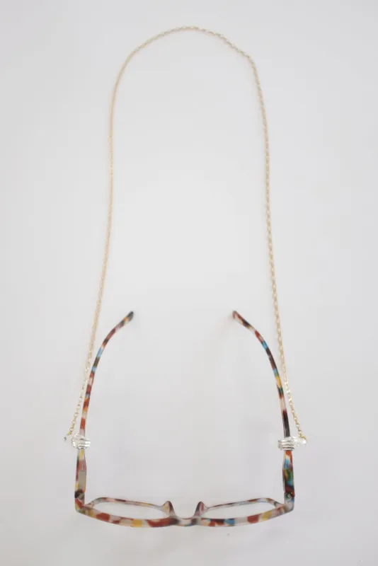 Beatriz Palacios Holding Hands Eyewear Chain sold by Beklina
