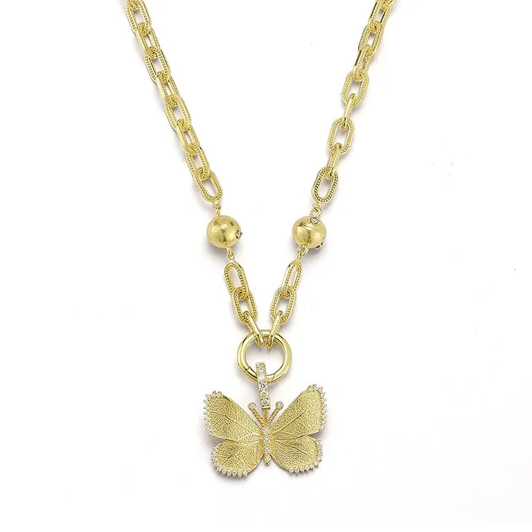 Medium Gold Butterfly Enhancer sold by Tanya Farah