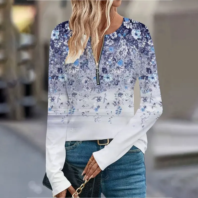 Blue long-sleeved top sold by Viva Estel