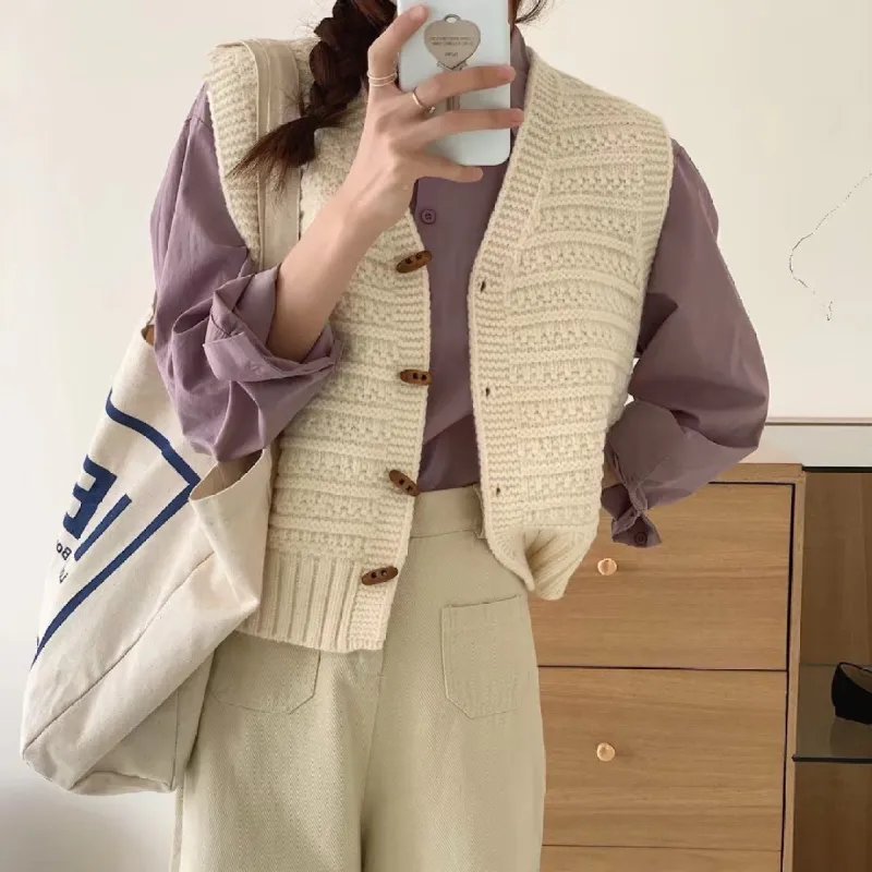 Basic Plain Sleeveless Cardigan sold by Viva Estel