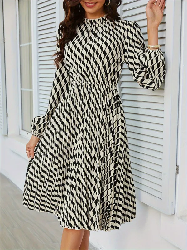 Black and White Pleated Waist-Cinching Dress sold by Viva Estel