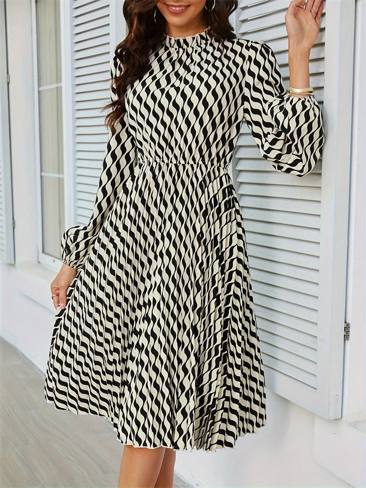 Black and White Pleated Waist-Cinching Dress sold by Viva Estel