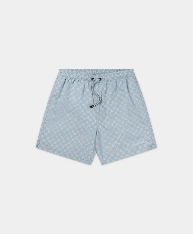 Subdued Blue Logo Swim shorts sold by Daily Paper