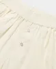 Gardenia Monogram Relaxed Short sold by Daily Paper