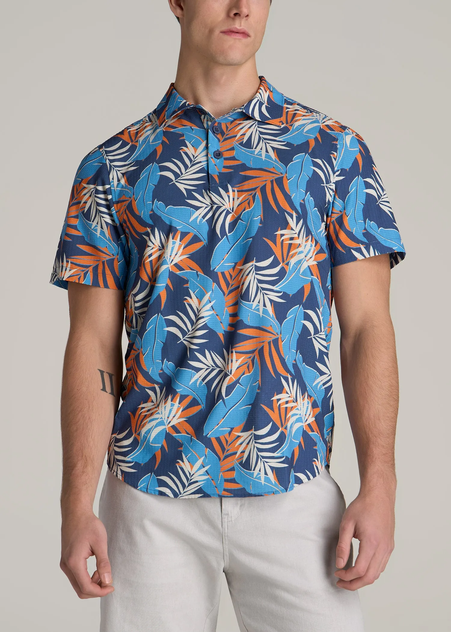 Coastal Perforated Polo Shirt for Tall Men in Blue and Orange Palms sold by American Tall