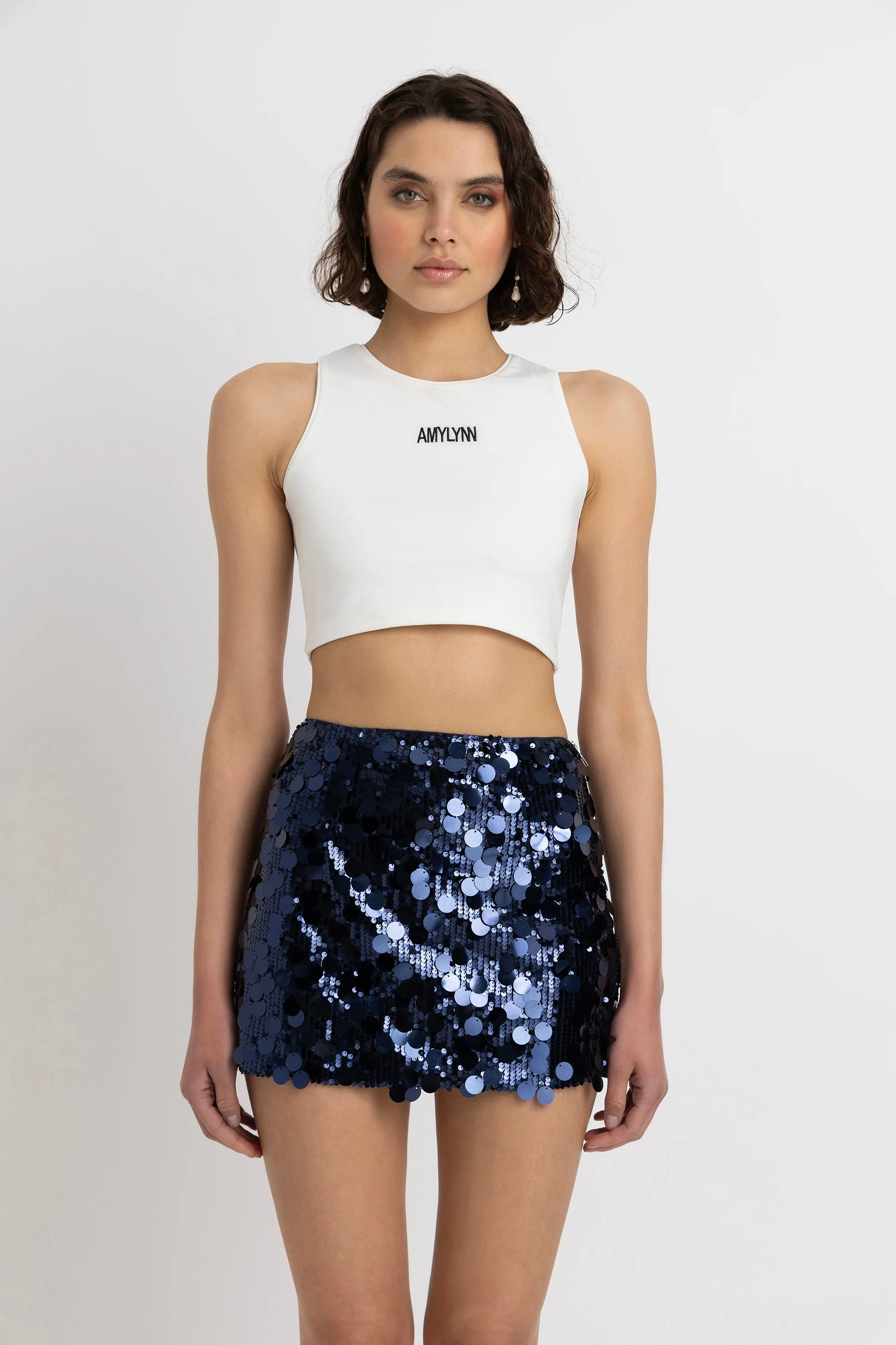 Oceane Navy Disc Sequin Mini Skirt sold by AMYLYNN