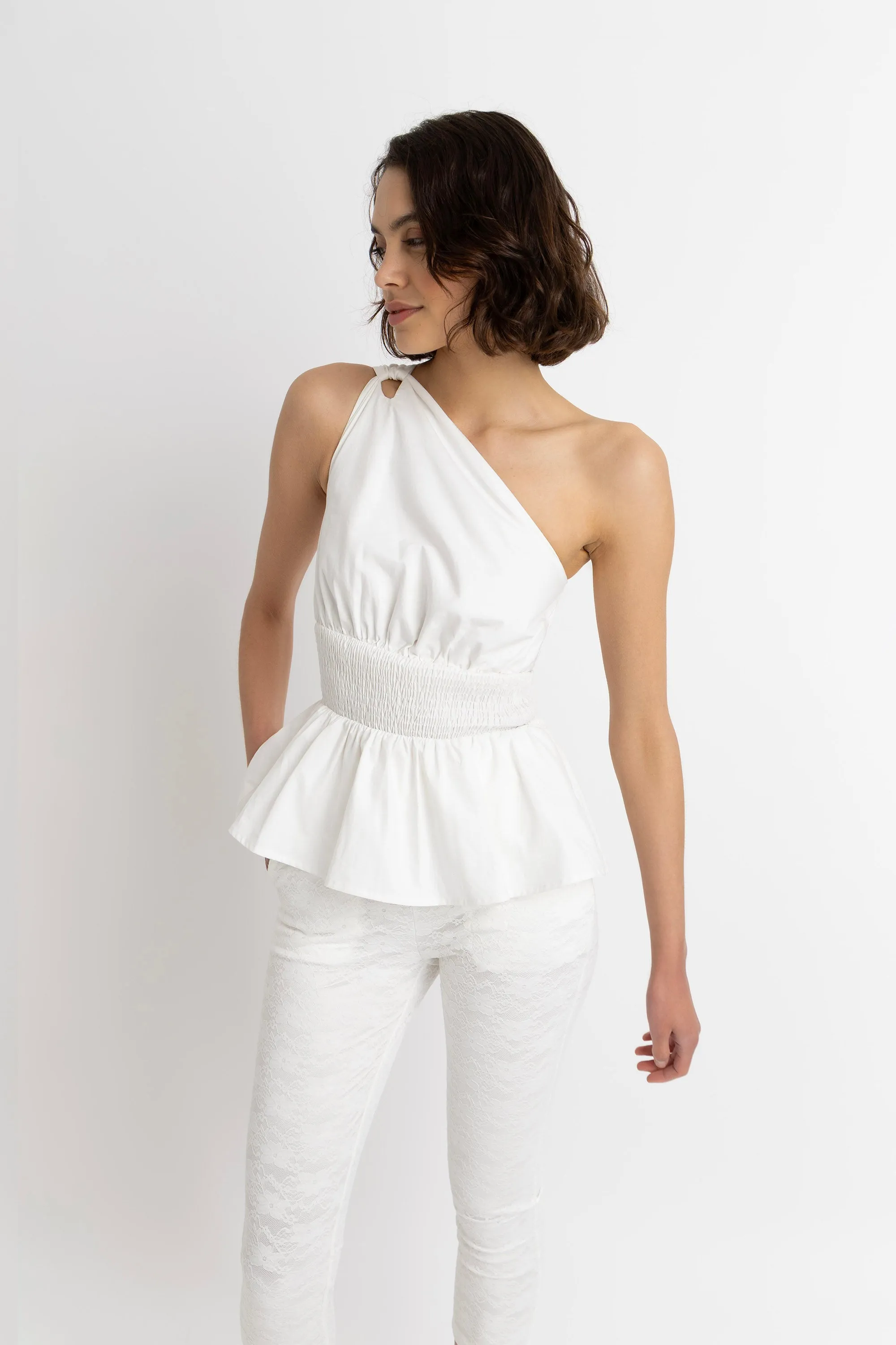 Allegra Pure Cotton Asymmetrical Peplum Top sold by AMYLYNN