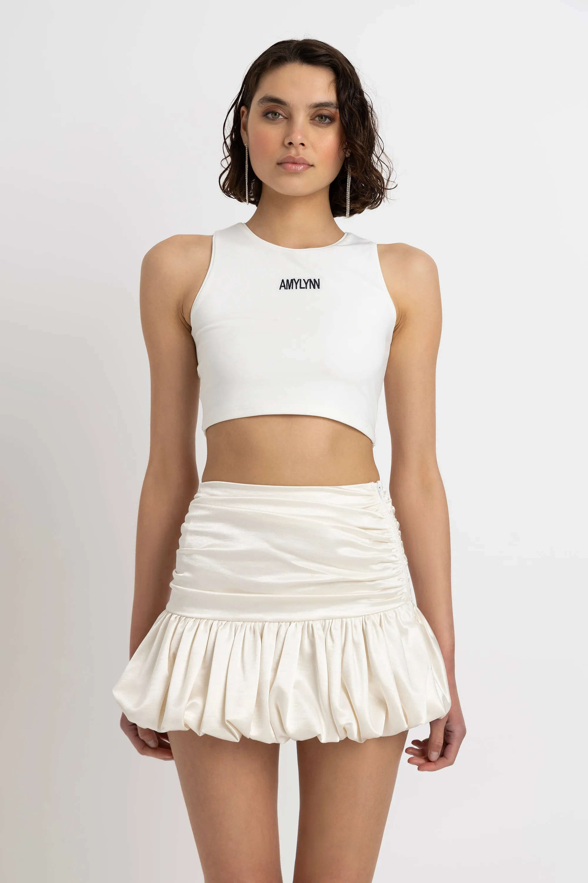 Bella Cream Satin Puffball Mini Skirt sold by AMYLYNN