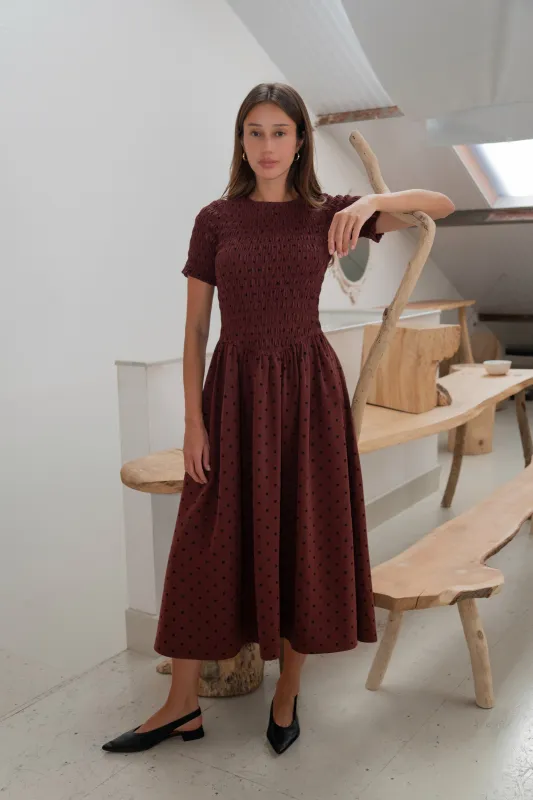 Beatrix Smocked Plum Polka Dot Midi Dress sold by AMYLYNN
