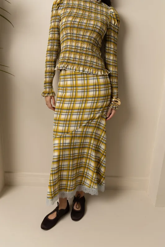Sunnie Yellow Plaid Asymetric Lace Trim Skirt sold by AMYLYNN
