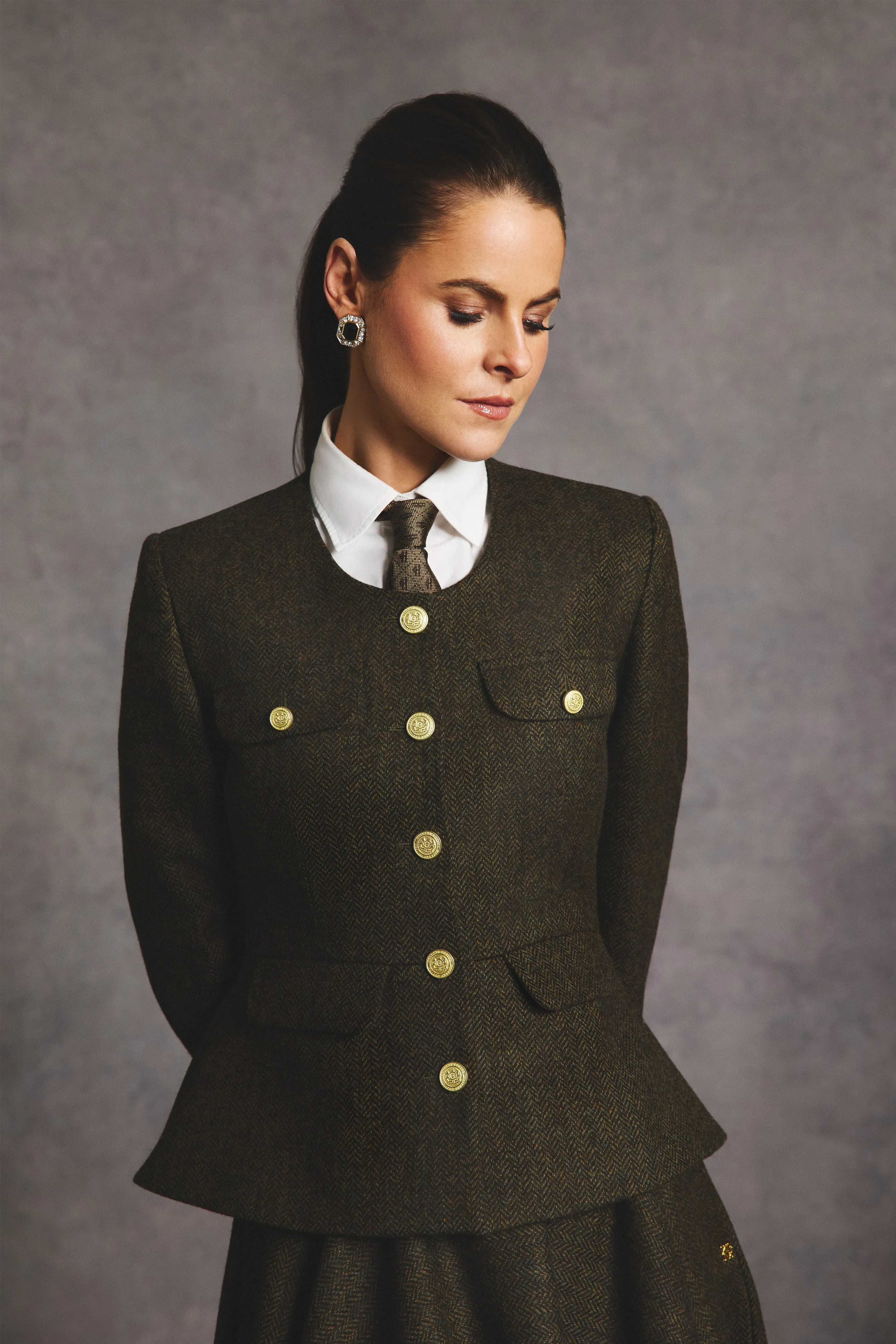 Tailored Peplum Jacket (Dark Green Herringbone) sold by Holland Cooper