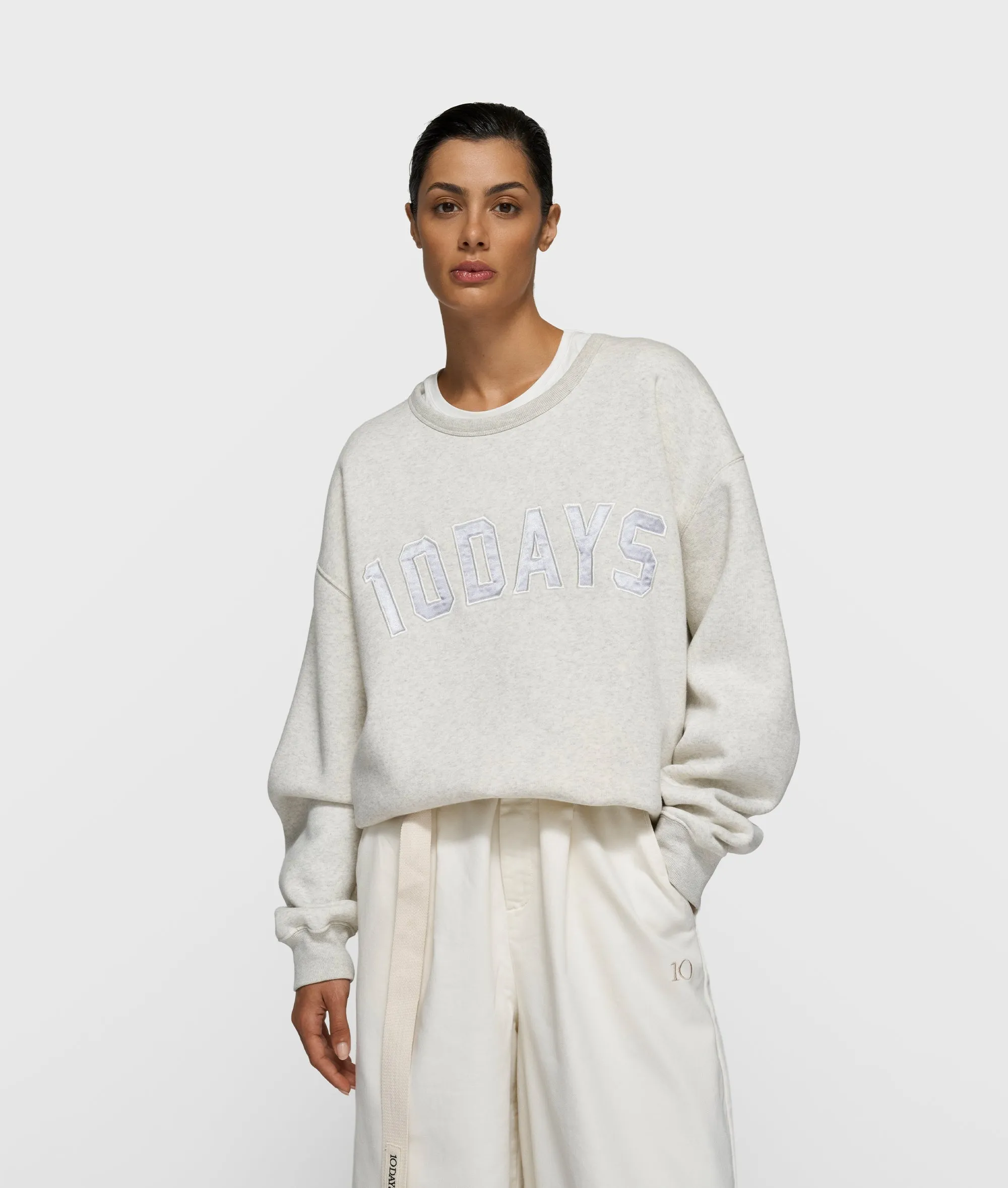 statement sweater | soft white melee sold by 10days