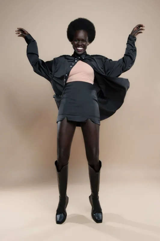 Ivy Satin Black Mini Skirt sold by Makara Wear