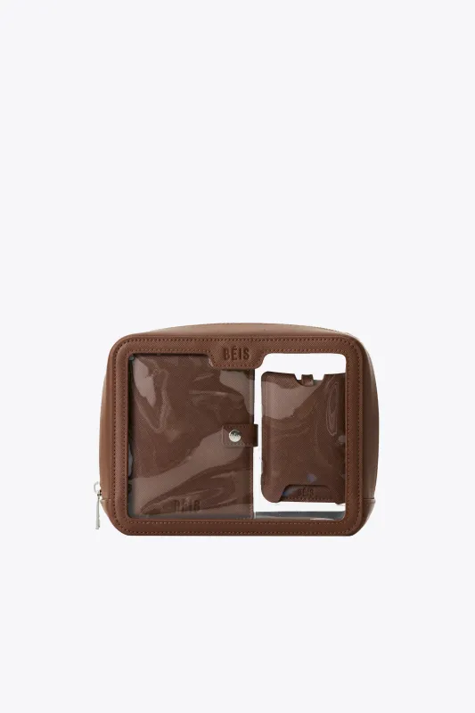 The Passport & Luggage Tag Set in Maple sold by Beis