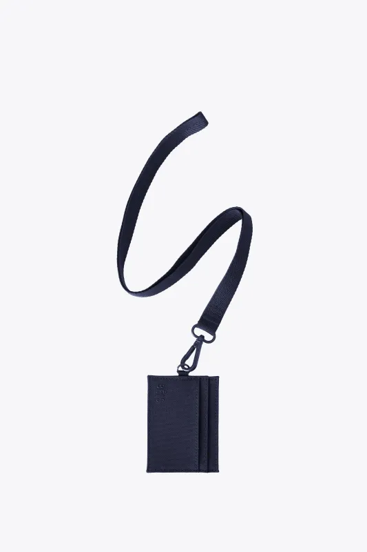 The ID Card Holder in Navy sold by Beis