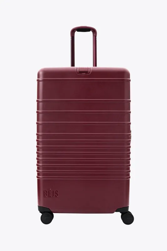 The Large Check-In Roller in Burgundy made by Beis