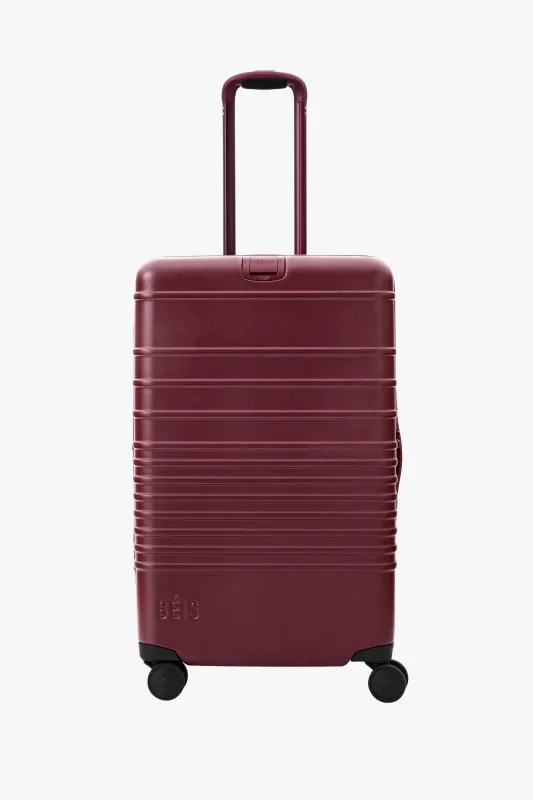 The Medium Check-In Roller in Burgundy made by Beis