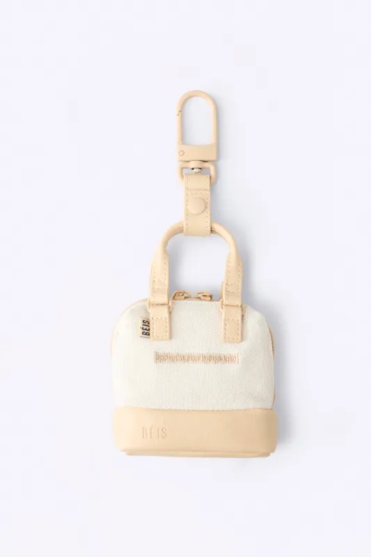 The Micro Weekender Charm in Beige made by Beis