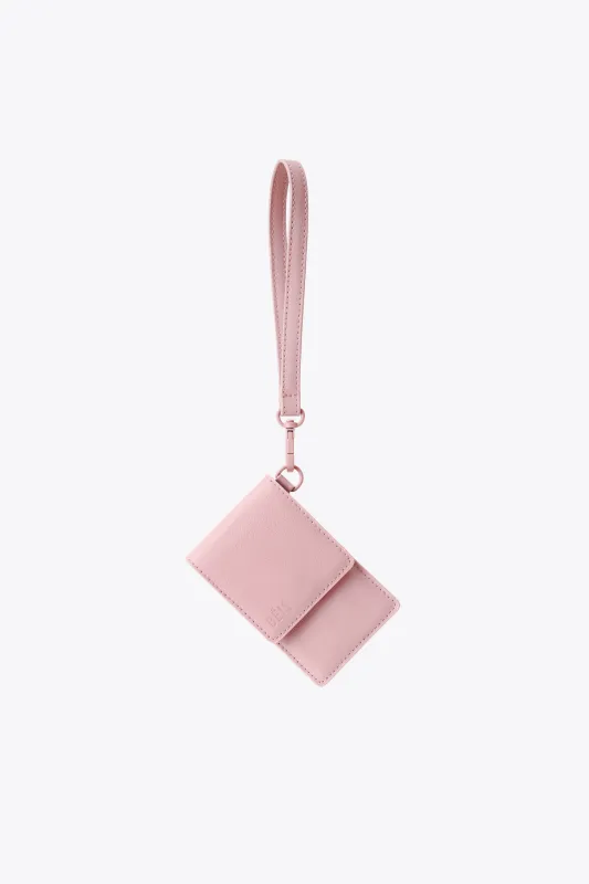 The ID Wristlet in Atlas Pink sold by Beis