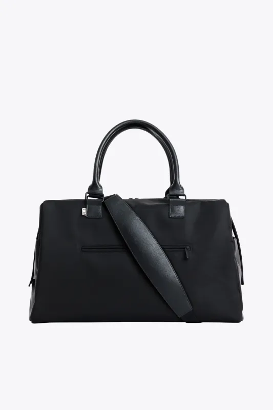 The Commuter Duffle in Black sold by Beis