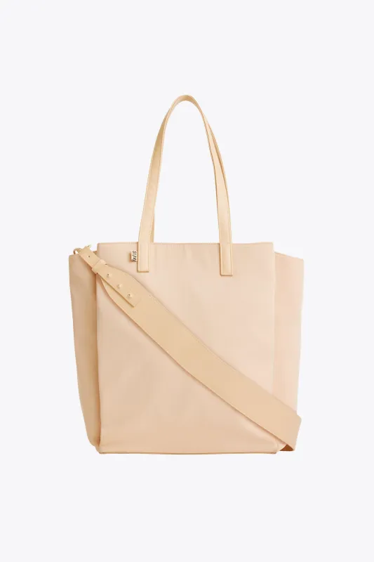 The Commuter Tote in Beige sold by Beis
