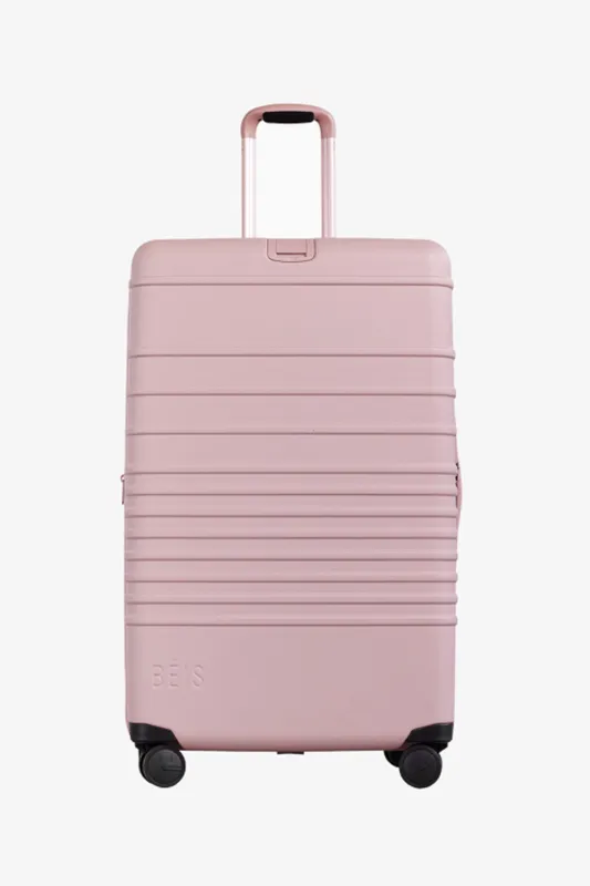 The Large Check-In Roller in Atlas Pink sold by Beis