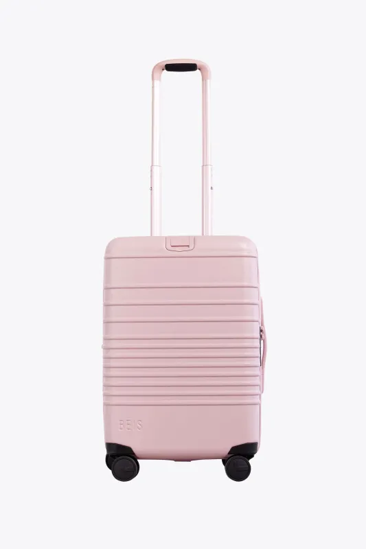 The Carry-On Roller in Atlas Pink made by Beis