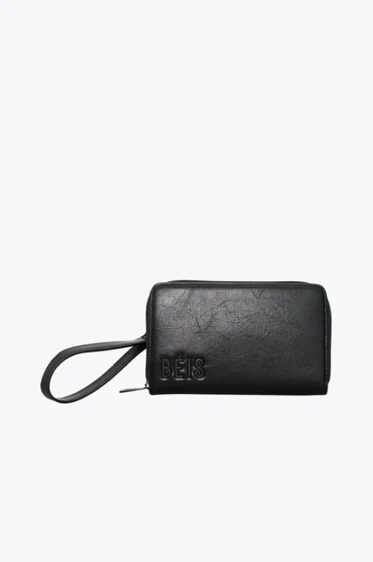 The Travel Wallet in Black sold by Beis