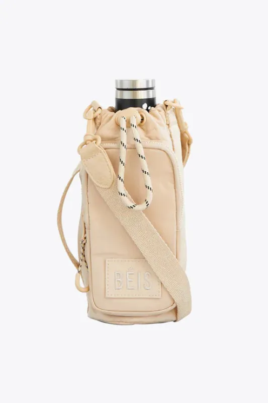 The Water Bottle Sling in Beige made by Beis