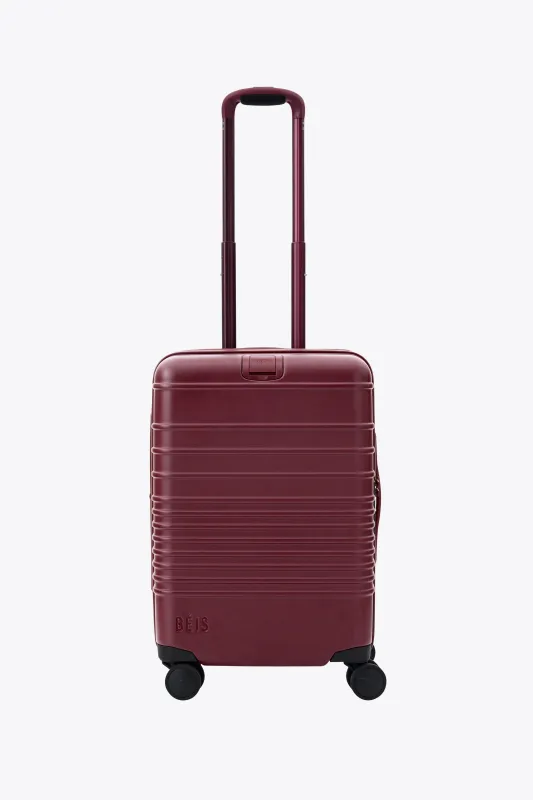 The Carry-On Roller in Burgundy made by Beis