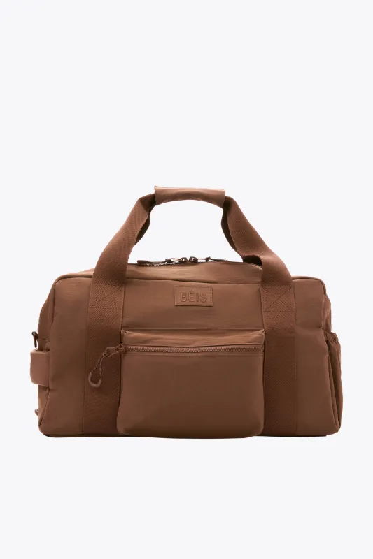 The Sport Duffle Backpack in Maple sold by Beis