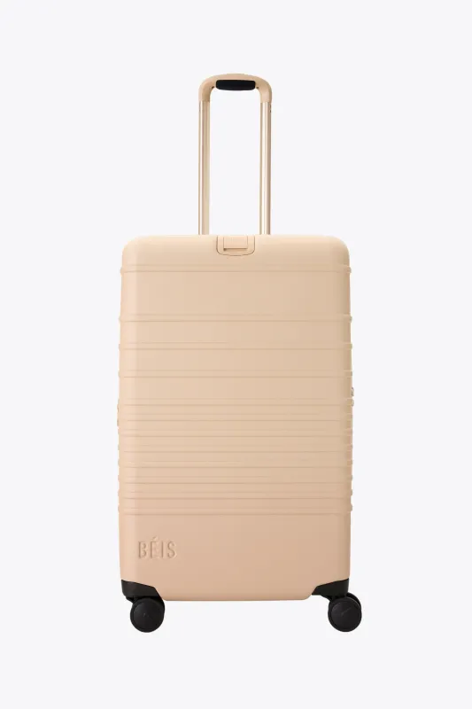 The Medium Check-In Roller in Beige made by Beis