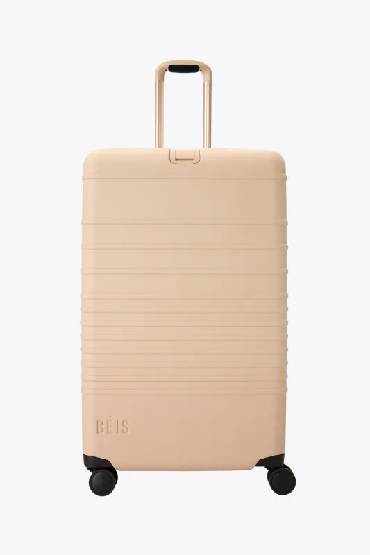 The Large Check-In Roller in Beige sold by Beis