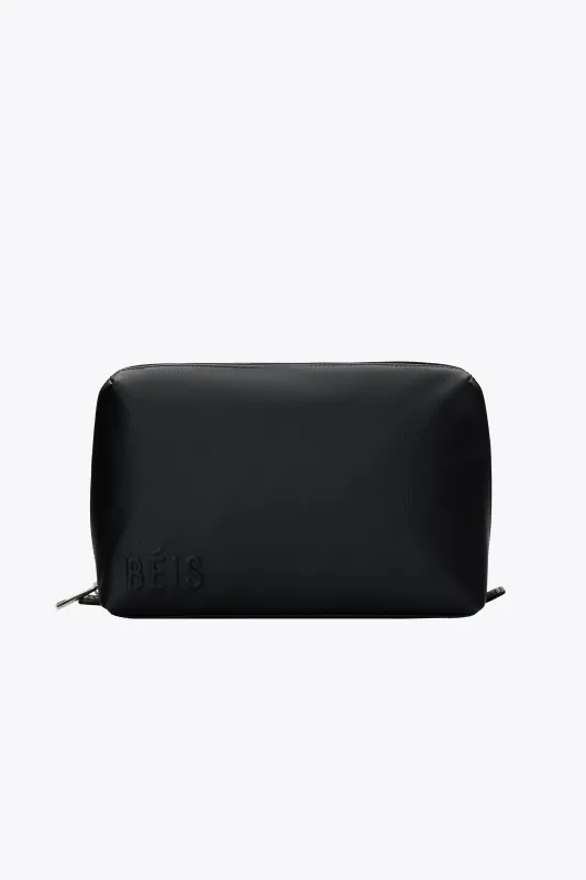 The Medium Cosmetic Pouch in Black sold by Beis