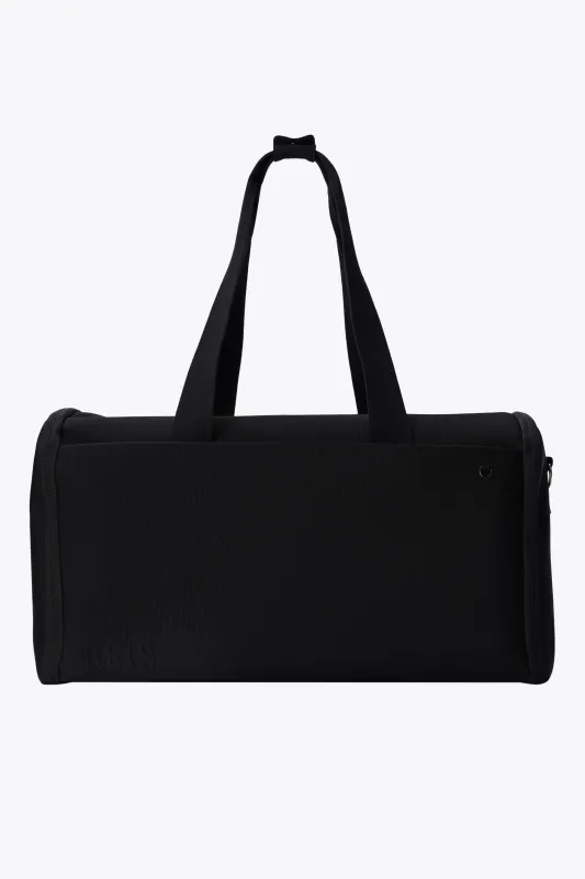 The Garment Duffle Bag in Black made by Beis