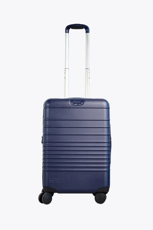 The Carry-On Roller in Navy made by Beis