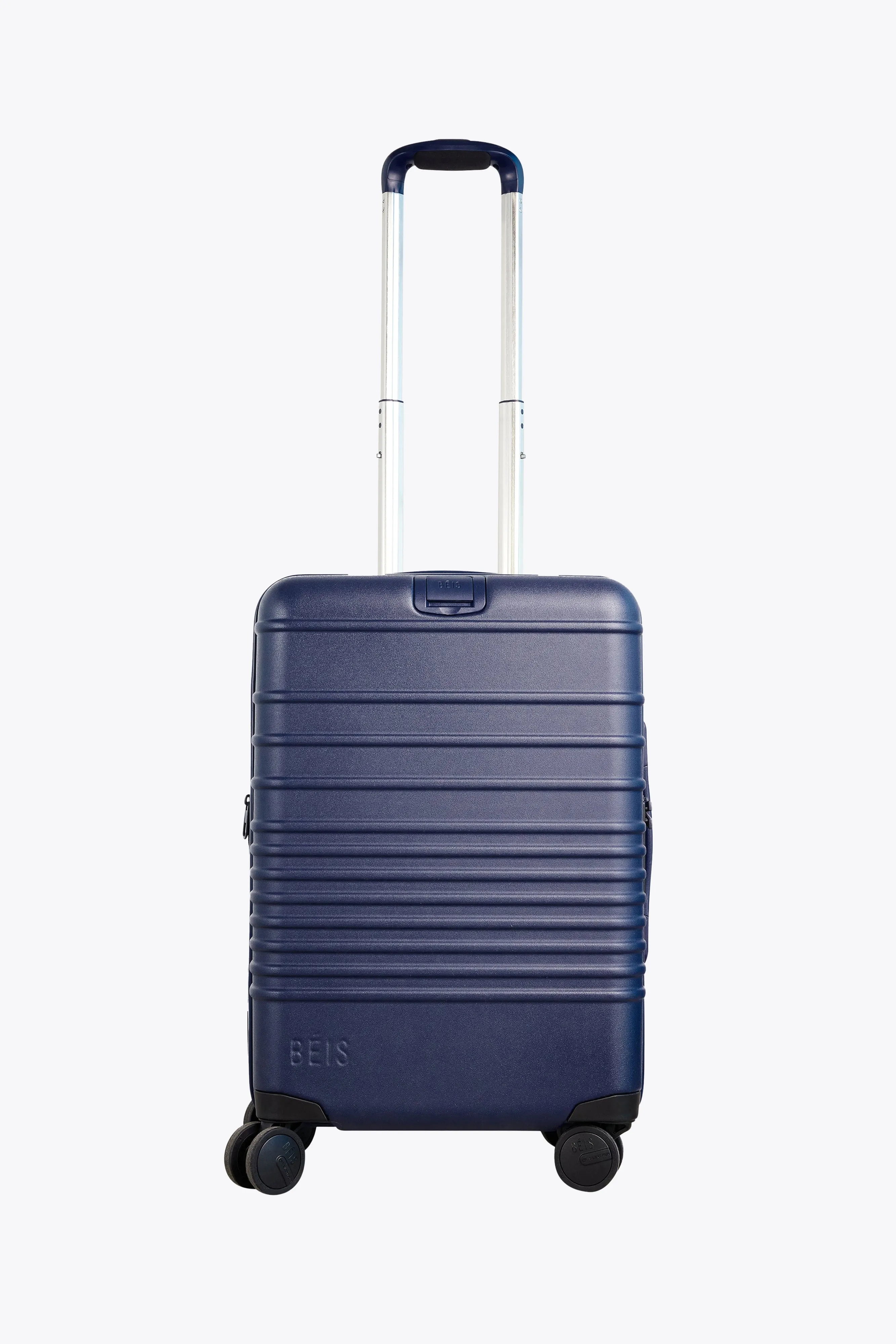 The Carry-On Roller in Navy sold by Beis
