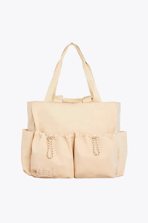 The Sport Carryall in Beige sold by Beis