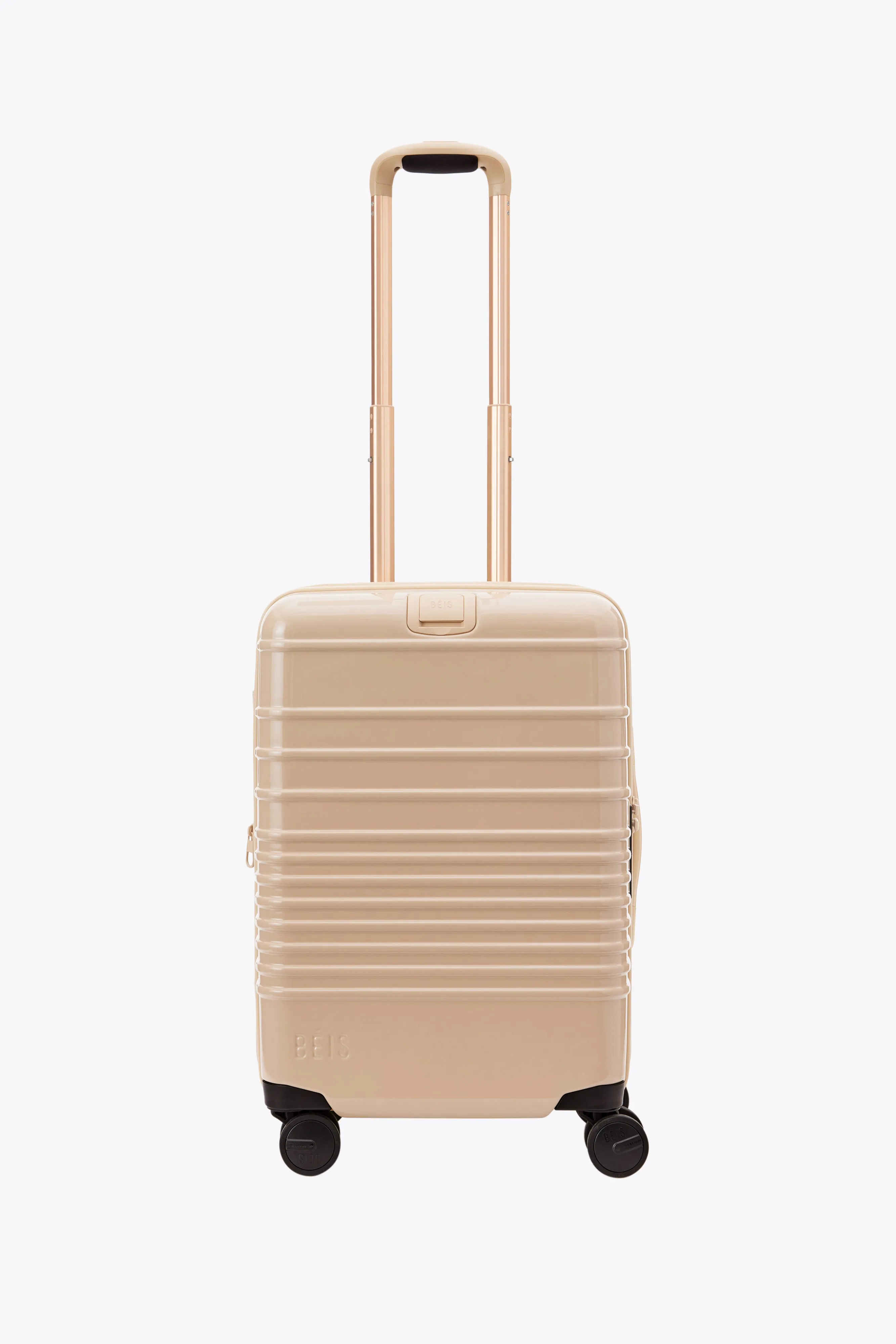 The Carry-On Roller in Glossy Beige sold by Beis