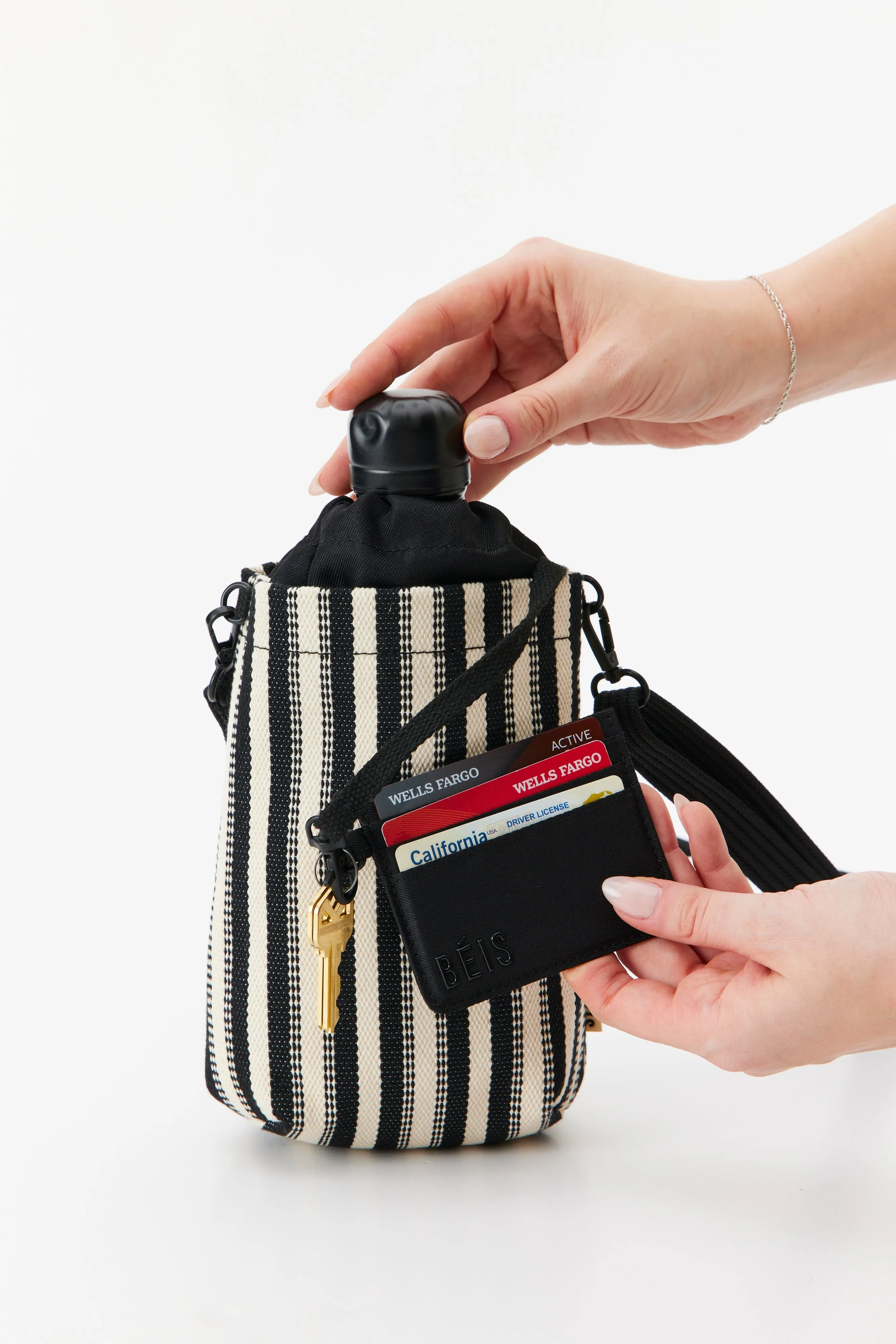 The Water Bottle Crossbody in Black Stripe sold by Beis product image thumbnail 4