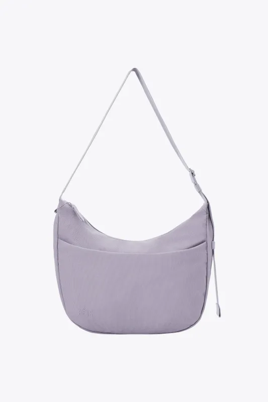 The Carryall Crossbody in Lavender made by Beis