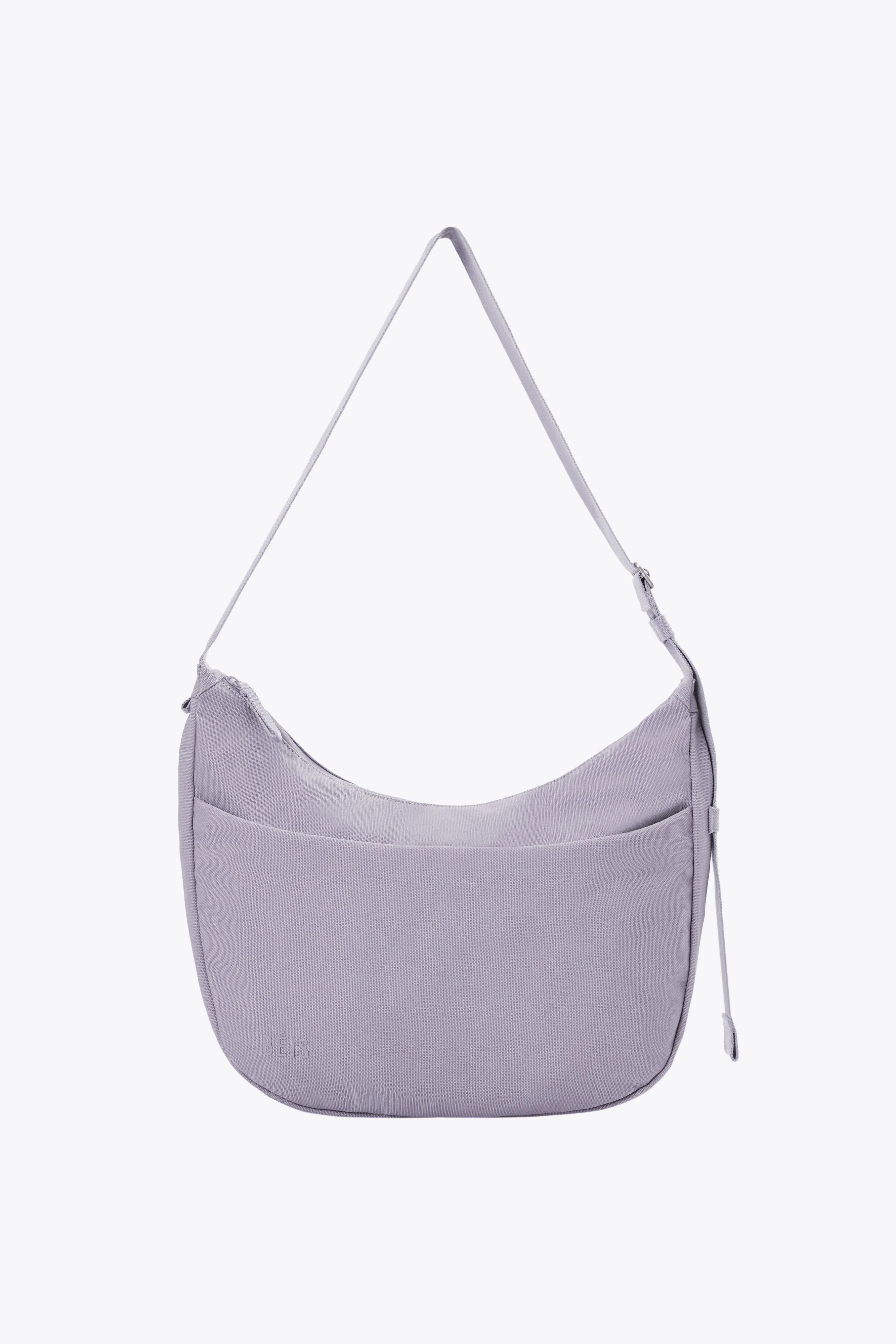The Carryall Crossbody in Lavender sold by Beis