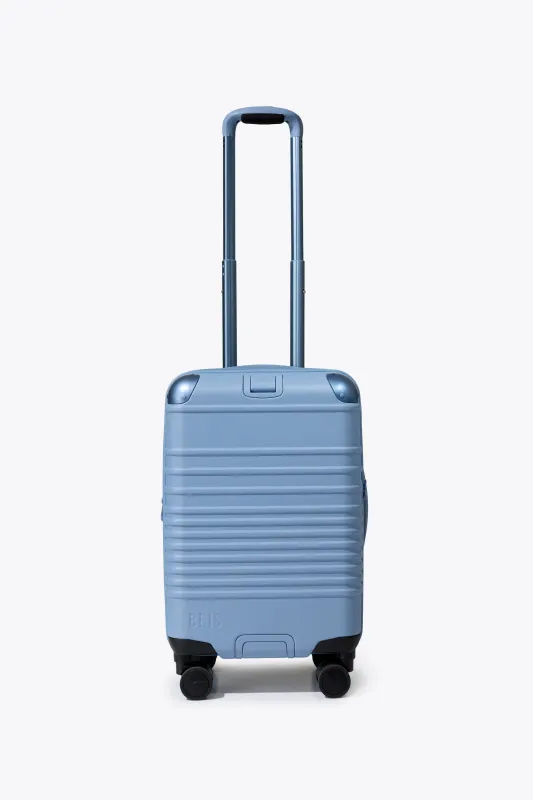 The Hybrid Carry-On Roller in Dusty Blue made by Beis