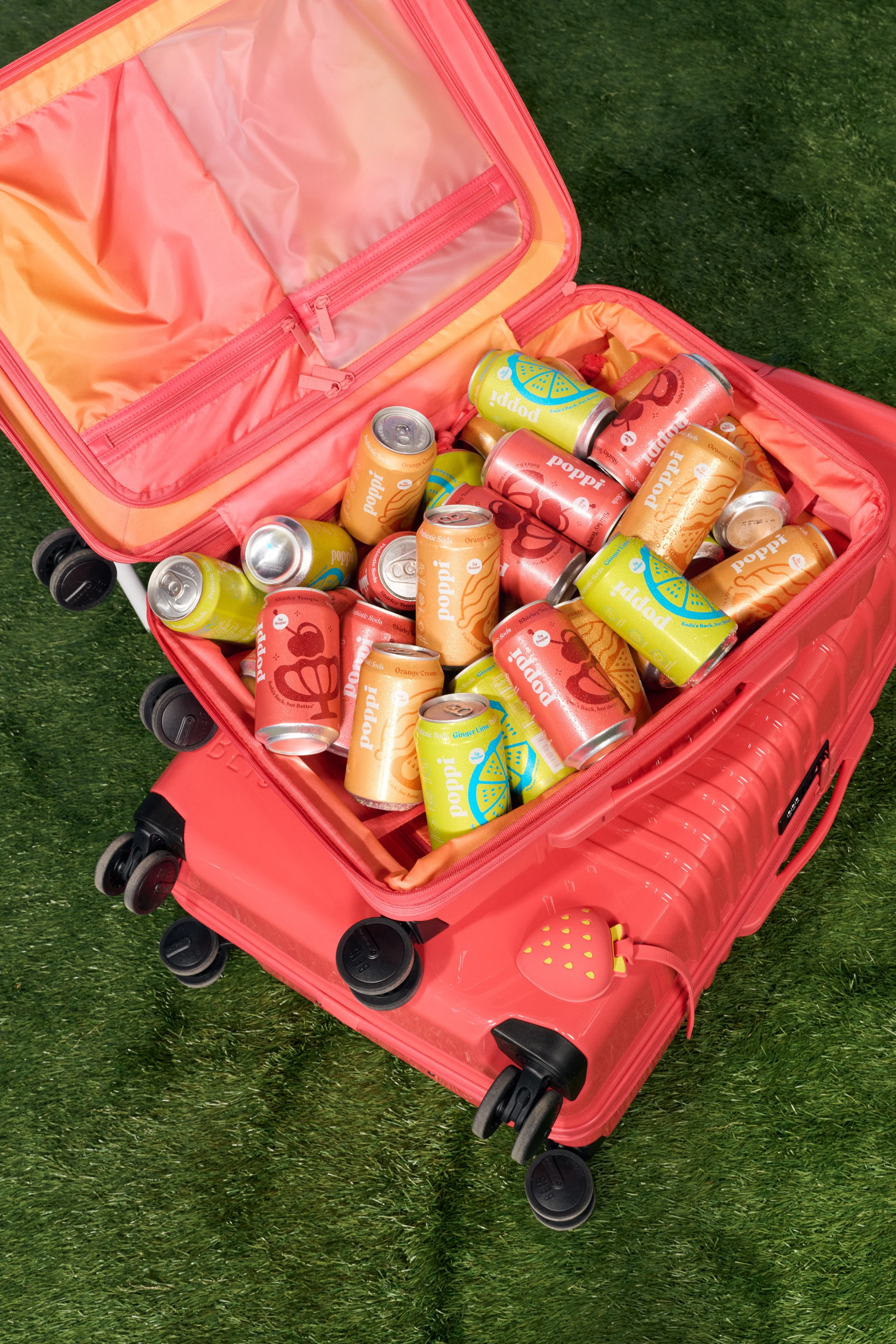 BÉIS x poppi The Carry-On Roller in Glossy Fruit Punch sold by Beis product image thumbnail 3