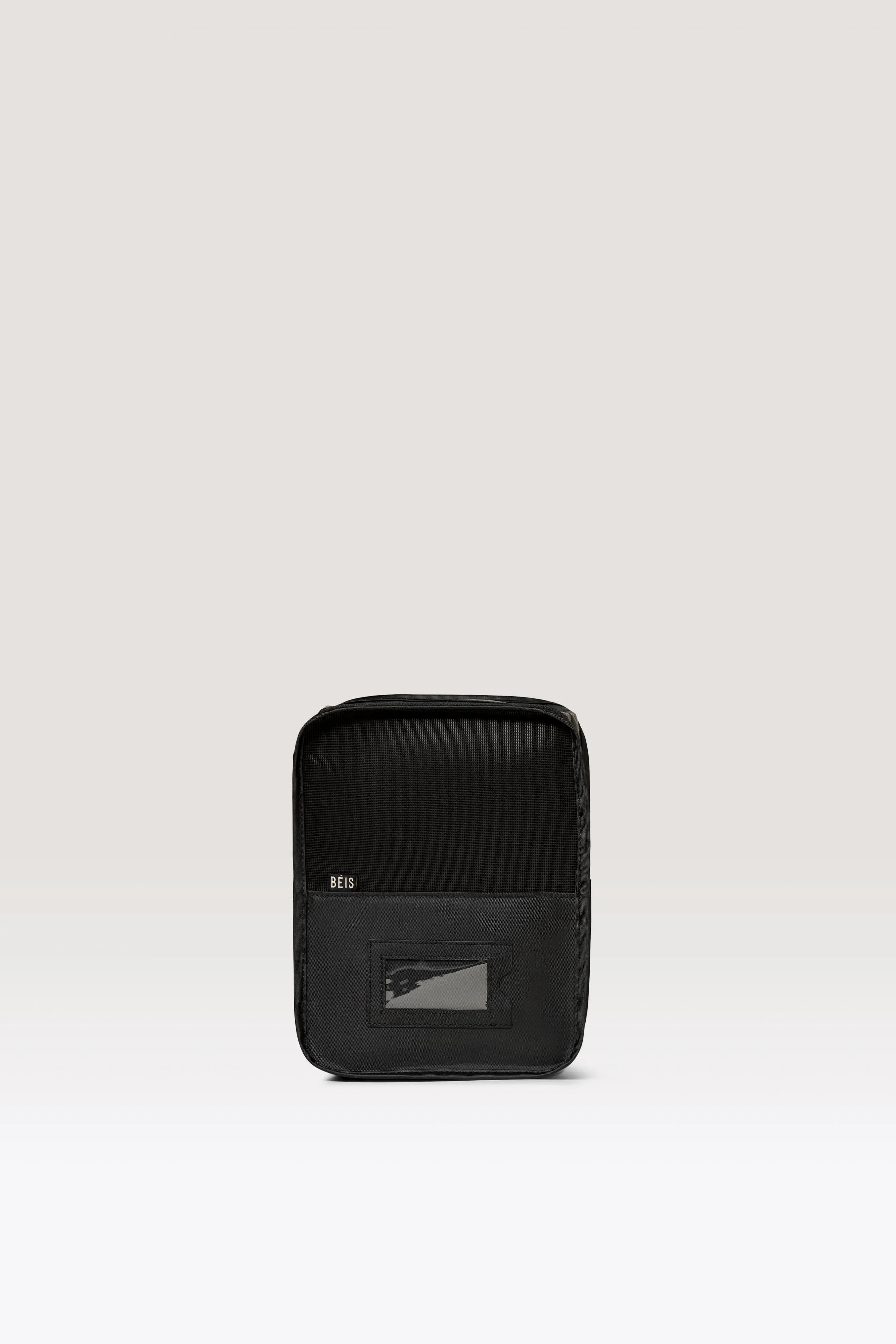 The Packing Cube Medium in Black sold by Beis