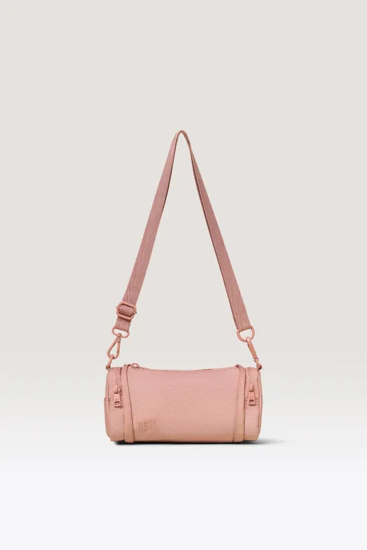 The Expandable Crossbody Charm in Atlas Pink made by Beis