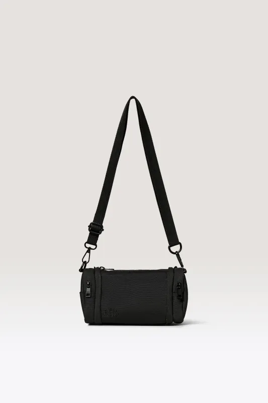 The Expandable Crossbody Charm in Black made by Beis