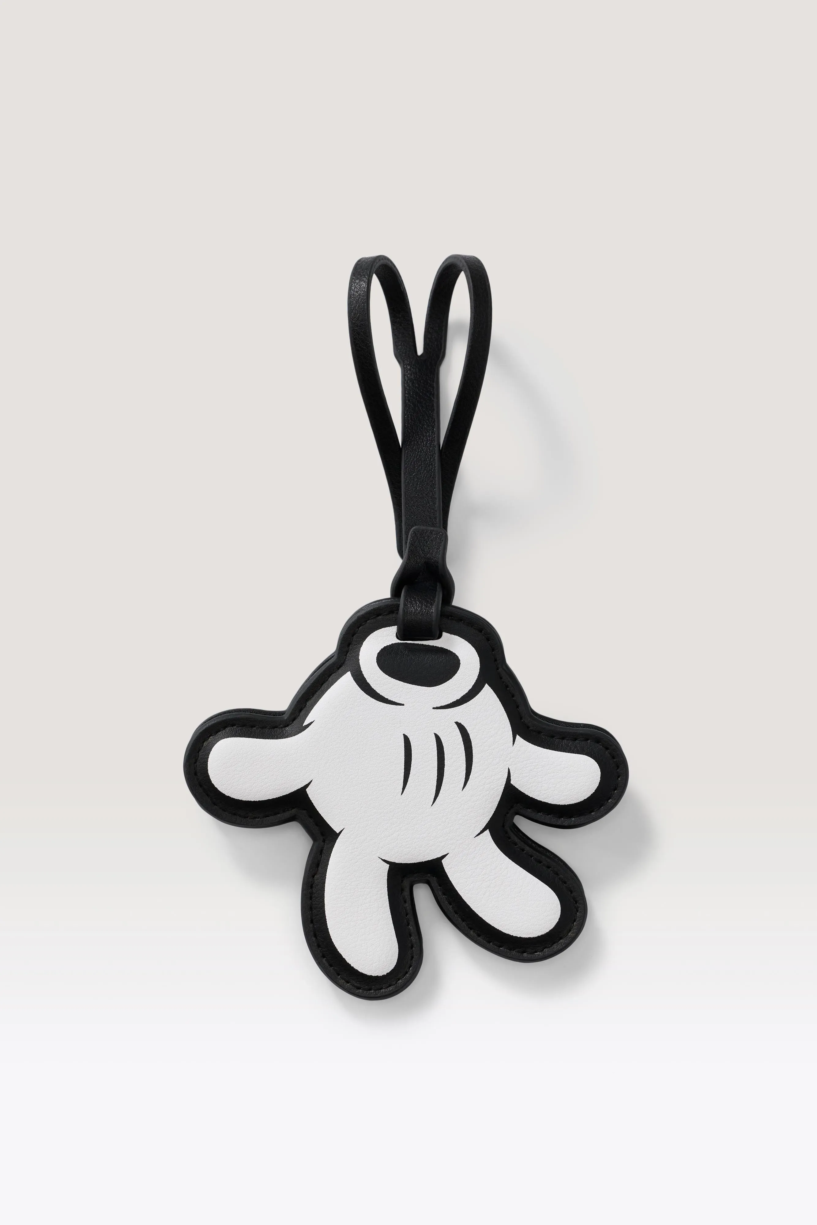 The Mickey Mouse Glove Mirror Charm in Black sold by Beis