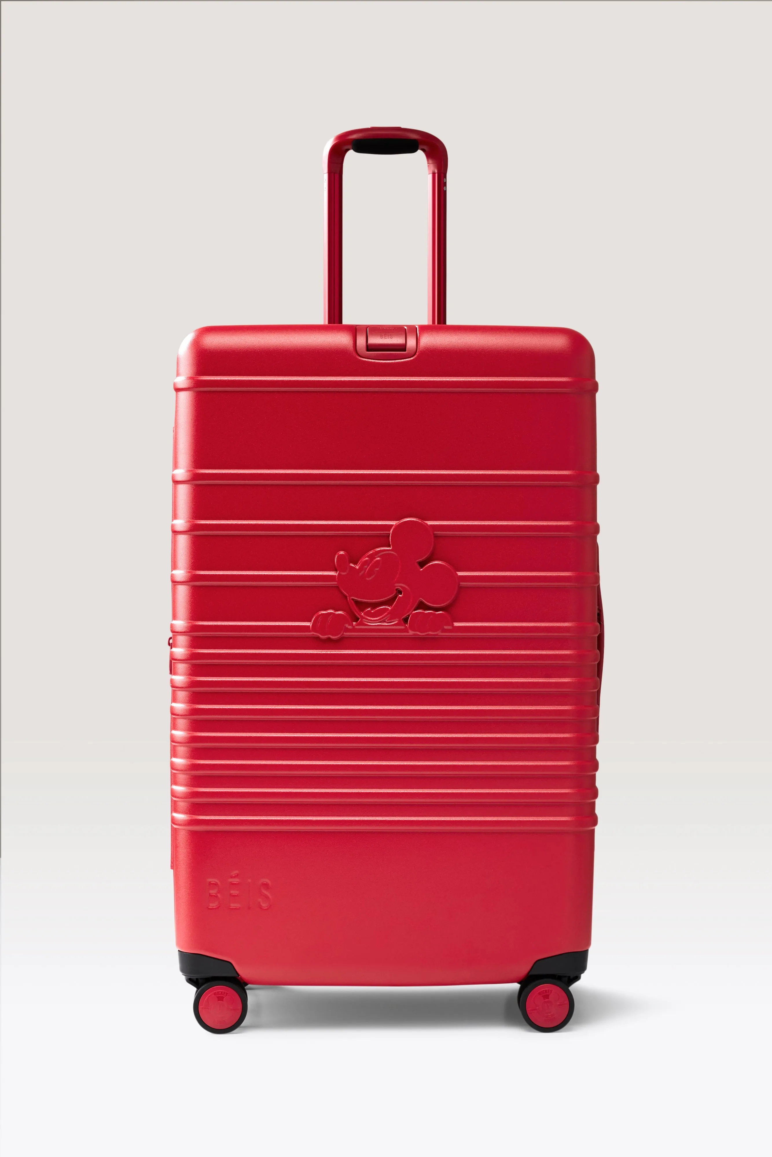 The Disney Large Check-In Roller in Mickey Mouse Red sold by Beis